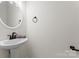 Bathroom with vanity sink and dark faucet at 103 Devonshire Ln, Salisbury, NC 28146