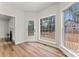 Breakfast nook boasts wood floors, many windows, and a backyard view at 103 Devonshire Ln, Salisbury, NC 28146