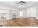 Spacious living room features open-concept design, wood floors, and built-in bookshelves at 103 Devonshire Ln, Salisbury, NC 28146