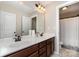 Bathroom featuring double sink vanity with modern fixtures and framed mirror at 1030 Archibald Ave, Fort Mill, SC 29708