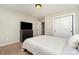 Bright bedroom with a dresser, television and closet at 1030 Archibald Ave, Fort Mill, SC 29708