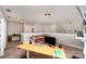 Cozy bonus room with plush sofa, desk space and soft lighting from two recessed lights at 1030 Archibald Ave, Fort Mill, SC 29708