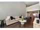Open-concept living room with high ceilings, dark wood floors, and views into the kitchen at 1030 Archibald Ave, Fort Mill, SC 29708