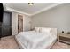 Comfortable primary bedroom offering neutral tones, soft carpet, and ample natural light at 1030 Archibald Ave, Fort Mill, SC 29708