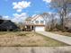 Attractive two-story home on a spacious lot with a long driveway at 105 Elk Ct, Mount Holly, NC 28120