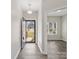 Bright entryway with hardwood floors and an open view into other rooms at 105 Elk Ct, Mount Holly, NC 28120