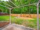 Backyard featuring a pergola, patio, wooden fence, fire pit, and a swing set at 113 Devynn Ridge Ct, Mount Holly, NC 28120