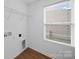 Bright laundry room with a utility sink hookups and a window at 113 Devynn Ridge Ct, Mount Holly, NC 28120