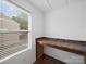 Bright office area featuring natural light from the window and a built-in desk at 113 Devynn Ridge Ct, Mount Holly, NC 28120