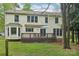 The backyard features a spacious deck, large windows, and plenty of room for outdoor enjoyment at 11333 Snapfinger Dr, Charlotte, NC 28277