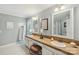 Spacious bathroom with double sinks, granite countertops, and large mirrors at 11333 Snapfinger Dr, Charlotte, NC 28277