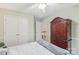 The bedroom features a large wooden dresser for plenty of storage space, perfect for comfortable living at 11333 Snapfinger Dr, Charlotte, NC 28277
