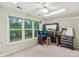A well-lit bedroom with a corner desk area, perfect for a home office or study space at 11333 Snapfinger Dr, Charlotte, NC 28277