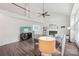 Bright open living area with vaulted ceilings, a ceiling fan, and an adjoining dining area at 11333 Snapfinger Dr, Charlotte, NC 28277