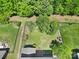 Expansive backyard features lush landscaping, a fenced perimeter, and a serene setting at 128 Front Porch Dr, Rock Hill, SC 29732