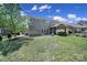 Large backyard with well-maintained lawn and some landscaping at 128 Front Porch Dr, Rock Hill, SC 29732