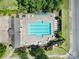 Top-down view of community pool with ample seating offers a refreshing retreat for residents at 128 Front Porch Dr, Rock Hill, SC 29732