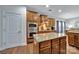 Well-equipped kitchen featuring modern appliances, granite countertops, a center island, and ample cabinet space at 128 Front Porch Dr, Rock Hill, SC 29732
