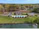 An aerial view of the neighborhood pool surrounded by lush trees and community spaces at 130 Villa Lake Dr, Fort Mill, SC 29708