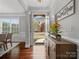 Welcoming foyer featuring hardwood floors, stylish furnishings, and a view to the front yard at 130 Villa Lake Dr, Fort Mill, SC 29708