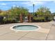 Hot tub with brick pillar entrance to the community pool area, overlooking the lake at 130 Villa Lake Dr, Fort Mill, SC 29708