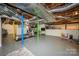 Unfinished basement area offering potential for customized fitness or storage space at 139 S Laurel Ave, Charlotte, NC 28207