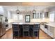 Spacious kitchen showcases modern pendant lighting, a large island with seating, and top-of-the-line appliances at 139 S Laurel Ave, Charlotte, NC 28207