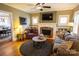 Cozy living room with a stone fireplace, built-in shelves, and comfortable seating at 139 S Laurel Ave, Charlotte, NC 28207