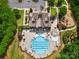 Stunning aerial view of community pool, playground, and green spaces, perfect for recreation and relaxation at 1430 Whitman Ct, York, SC 29745
