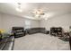 Spacious bonus room with a ceiling fan, carpet, and seating area with a workstation at 1430 Whitman Ct, York, SC 29745