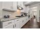 Well-equipped kitchen showcasing white cabinets, granite countertops, and modern stainless-steel appliances at 1430 Whitman Ct, York, SC 29745
