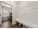 Laundry room featuring washer, dryer, bench, and overhead hooks at 1430 Whitman Ct, York, SC 29745