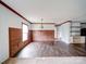 Open dining room offering wood accent wall and modern chandelier, perfect for Gathering meals at 1459 Wehunt Store Rd, Cherryville, NC 28021