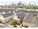 Townhome community with skyline views, street parking, and balcony patios, offering convenient urban living at 15041 New Amsterdam Ln, Charlotte, NC 28204