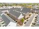 Townhome community with street parking, skyline views, and balcony patios, offering convenient urban living at 15041 New Amsterdam Ln, Charlotte, NC 28204