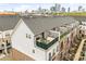 Townhome patio with skyline views and outdoor furniture, offering urban living with balcony patio at 15041 New Amsterdam Ln, Charlotte, NC 28204