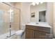 Bathroom features a glass enclosed shower and modern vanity at 15041 New Amsterdam Ln, Charlotte, NC 28204