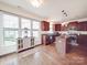 Bright kitchen with an island, granite countertops, stainless appliances, and lots of natural light at 15211 Windward Ln, Lancaster, SC 29720