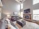 Inviting living room with a stone fireplace, large windows, and comfortable seating at 15211 Windward Ln, Lancaster, SC 29720