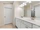 Bathroom features double sinks, white cabinets, and modern fixtures at 1650 Troon Dr, Salisbury, NC 28144