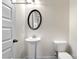 Charming half-bath with pedestal sink and modern fixtures at 1650 Troon Dr, Salisbury, NC 28144