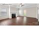 Bright living room features a fireplace and large windows offering lots of natural light at 1650 Troon Dr, Salisbury, NC 28144