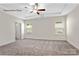 Spacious main bedroom features plush carpeting, neutral walls, and a ceiling fan at 1650 Troon Dr, Salisbury, NC 28144