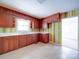 A bright kitchen showcasing a functional layout, window above the sink, and ample cabinet space at 167 Cedar Ln, Troutman, NC 28166