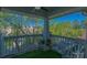 Cozy balcony with a seating area, artificial turf, and neighborhood views at 17143 Red Feather Dr, Charlotte, NC 28277