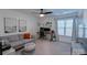 Well-lit, carpeted bedroom setup as an office at 17143 Red Feather Dr, Charlotte, NC 28277