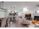 Spacious open-concept living area showcasing the kitchen, dining area, and comfortable seating arrangement at 17143 Red Feather Dr, Charlotte, NC 28277