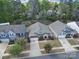 Aerial view of well-maintained homes, lovely yards, and mature trees at 1718 Still River Way, Fort Mill, SC 29708