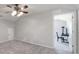 This bedroom features neutral walls, soft carpet and a ceiling fan at 1718 Still River Way, Fort Mill, SC 29708