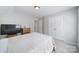 Bedroom with carpet, a large bed, dresser and closet at 1718 Still River Way, Fort Mill, SC 29708